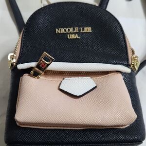 Nicole Lee Black and Cream Backpack with Pink Accents
